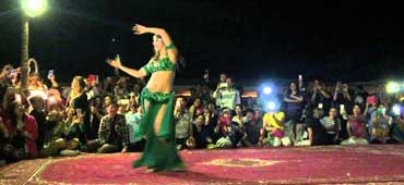 Live dance show Dubai at desert camp with fire performances