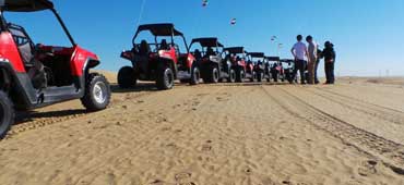 Group enjoying ATV rental Dubai tour