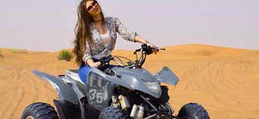 Polaris ATV rental Dubai through scenic golden dunes